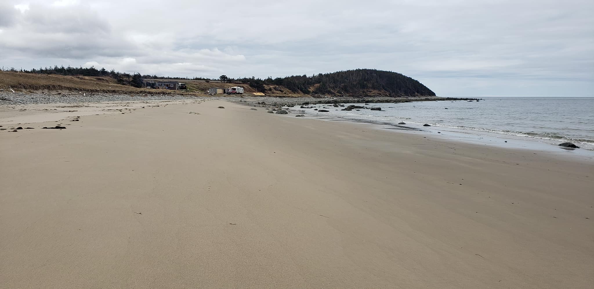 The long sand beach at Western Brook